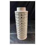 Tall white ceramic flower vase featuring an