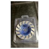 Diamond grinding cup wheel in protective plastic