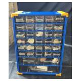 Blue multi-drawer organizer filled with a variety