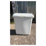 White plastic laundry hamper with a rectangular