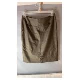 Brown Cleo skirt, size 10, featuring a subtle