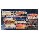 Large collection of VHS tapes featuring movies,