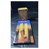 Two hardcover books featuring The Complete