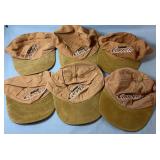 Six Labatt Copper baseball-style caps in a tan