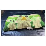 Soft character pillow featuring Grogu from Star