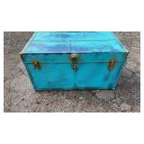 Large blue metal storage trunk with brass-tone