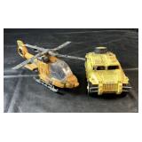 Two military-style plastic toys featuring a large