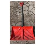 Garant snow shovel with wide red plastic scoop,