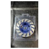 Diamond grinding cup wheel in protective plastic