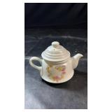White ceramic teapot from The Dioscany