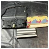 Three womenï¿½s accessories including a black