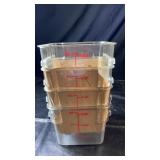 Four clear commercial-style food storage