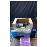 Box of reusable ice and freezer packs in various