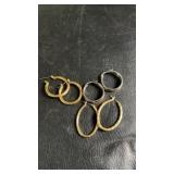 Three pairs of hoop earrings in gold-tone and