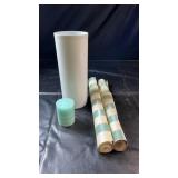 Two rolls of green and cream striped wallpaper