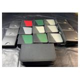 Collection of 16 disc storage cases, including 15