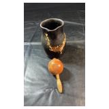 Black pottery vase with brown/gold decorative