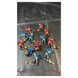 Collection of miniature hockey player figures in