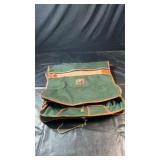 Green Antler garment bag with brown trim,