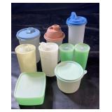 Collection of Tupperware containers in various