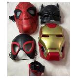 Collection of superhero costume masks featuring