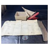 Maritime collection featuring a model sailboat,