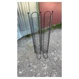 Tall black metal CD storage rack with multiple