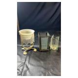 Three decorative candle holders in different