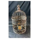 Ornate metal birdcage-style candle holder