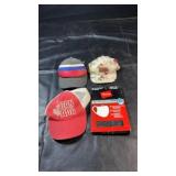 Three caps including a red and white Canada
