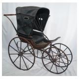 Antique baby carriage w wooden wheels