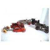 6 Cast iron toys - Dump trucks, motorcycle, steam