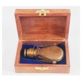 Miniature antique brass telescope in box
