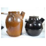 2  stoneware jugs (Brown) w spouts and wire handle