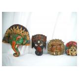 Collection of 4  beaded and hand made India Masks