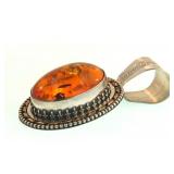 "Leonard Platero" designed lrg oval amber pendant