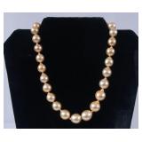 Large South Sea Champagne graduated pearl necklace