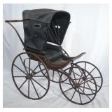 Antique baby carriage w wooden wheels