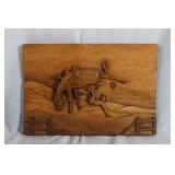 Carved wood relief "Cowboy Bucked off"