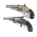 Two antique .32 Spur trigger revolvers