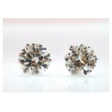 Pair 14kt gold 4.17 ctw diamond stud earrings