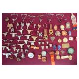 Assorted tie tacks, bolo ties, fobs, pins...