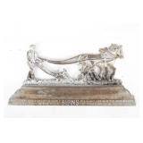 Cast iron man with 2 plow horses