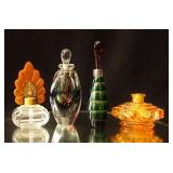 Four vintage art glass and vanity perfume bottles