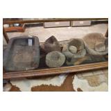 Five Native and Mexican stone grinders and manos