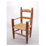 19c AMERICAN PRIMITIVE CHILD'S LADDERBACK ARMCHAIR