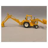 International Harvester Backhoe - Ertl - 25”x7”