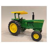 John Deere 4620 Diesel with Canopy - ERTL - 10”L x 7”H