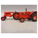 Pair of Diecast Case Tractors - 9”x5” tractor to left is plastic