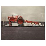 McCormick Farmall 806 with McCormick Farmall 5 Bottom Plow ERTL  in Plastic Display Case - 20'L x 8'W x 6'H